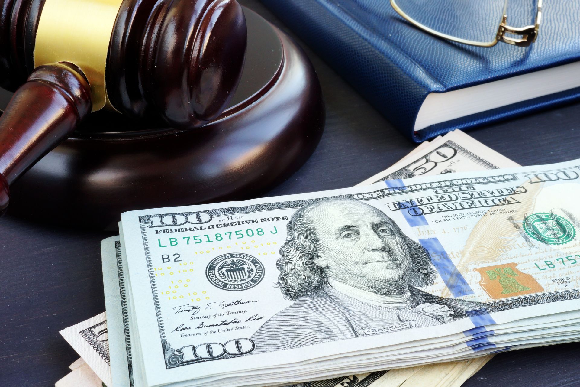 Gavel and money — bail bond services in Michigan
